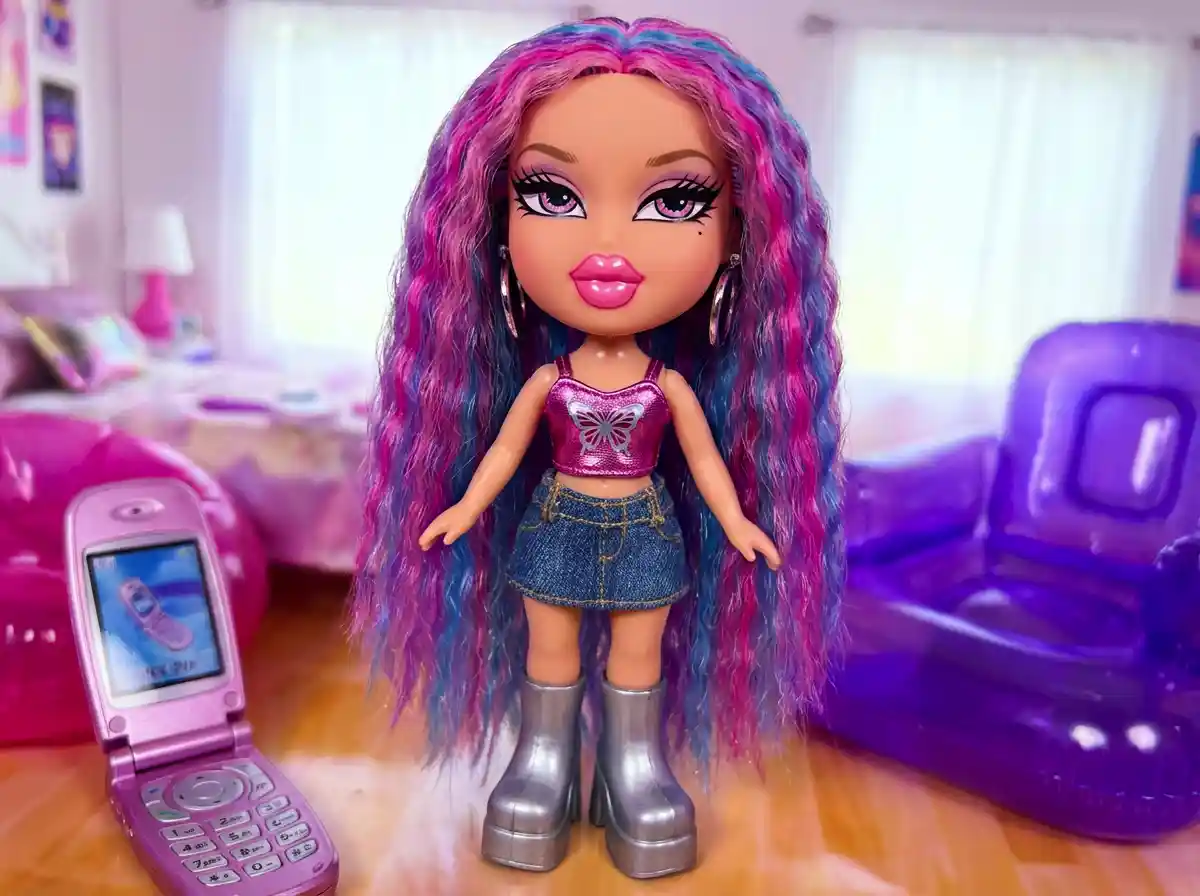 A Bratz-inspired doll with pink crop top, mini skirt, platform boots, glossy lips, dramatic eyeliner, Y2K fashion style, vibrant colors.